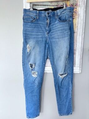 LuLaRoe With Love Jeans size 32 Distressed Skinny Jeans Stretch Denim